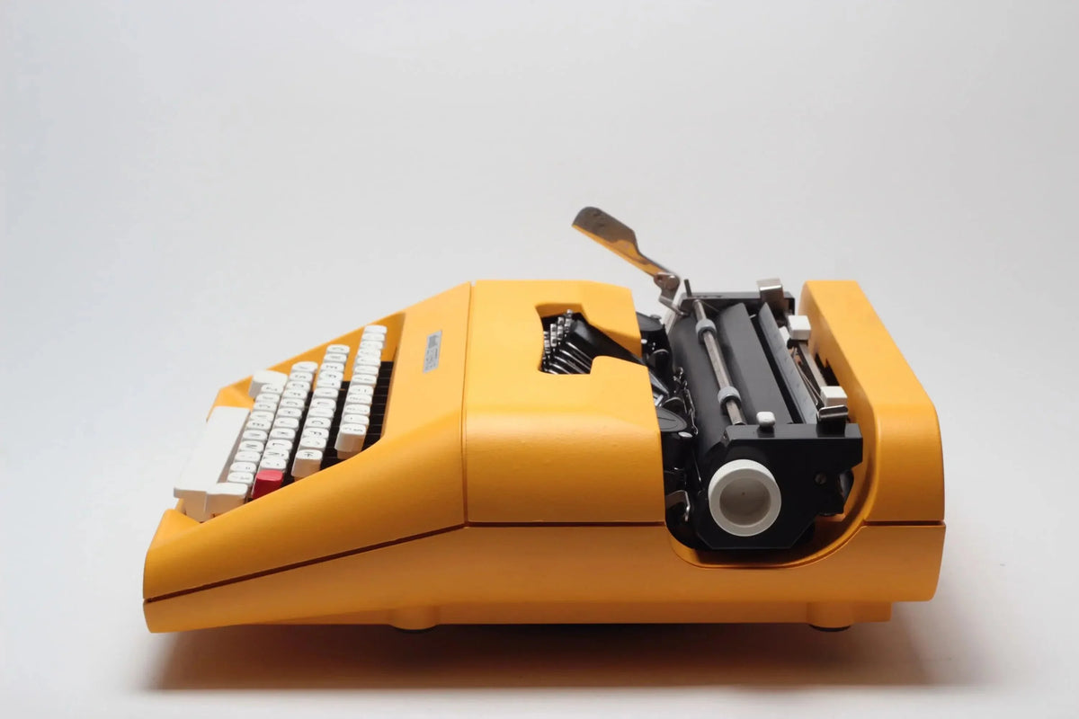 Iconic Olivetti Lettera 35 Yellow Vintage, Manual Typewriter, Restored - ElGranero Typewriter.Company