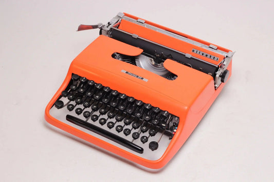 SOLD! Olivetti Pluma 22 Orange, Vintage Manual Typewriter, Restored - ElGranero Typewriter.Company