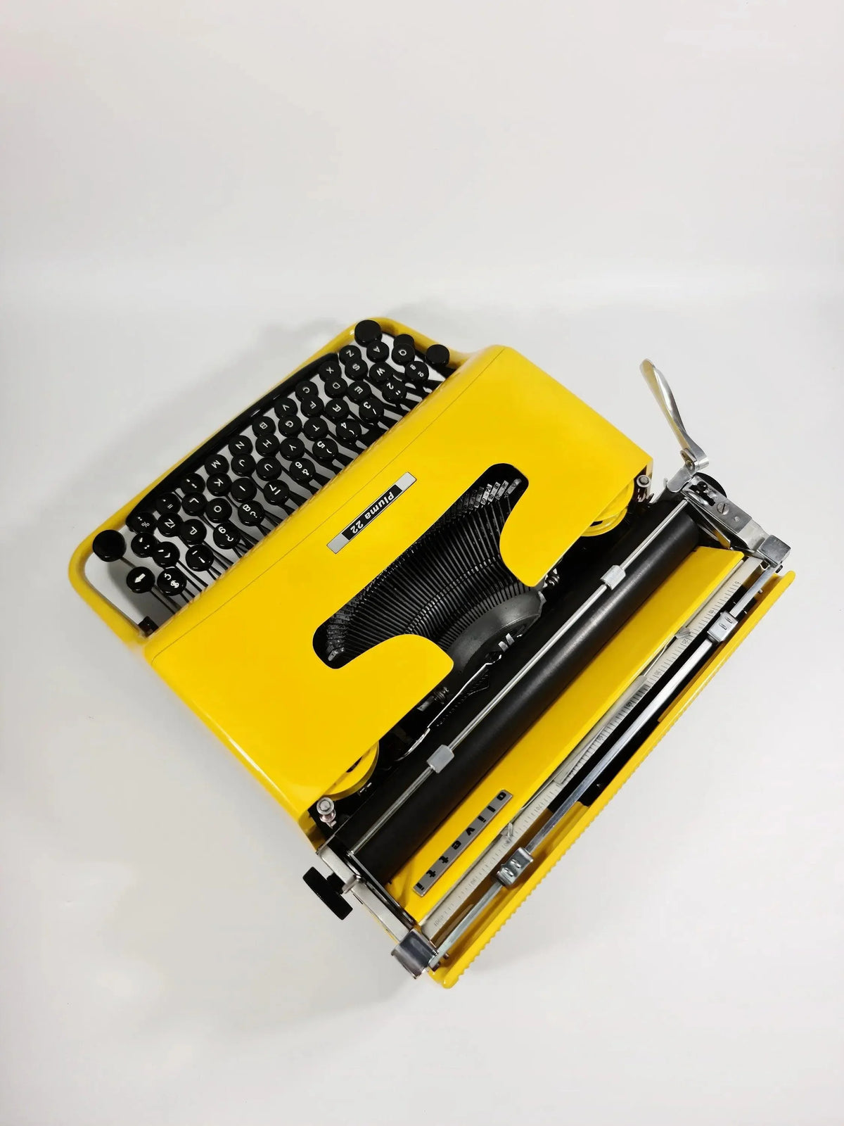 Olivetti Pluma 22, Pro Yellow Manual Vintage Typewriter, Restored - ElGranero Typewriter.Company
