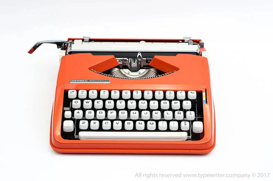 SOLD! Cursive font! Hermes Baby Orange, Vintage Manual Typewriter, Restored - ElGranero Typewriter.Company
