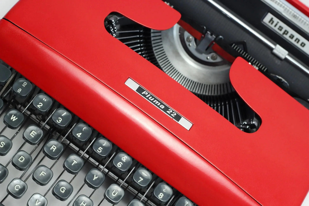 SOLD! Olivetti Pluma 22 Red, Vintage Manual Typewriter, Restored - ElGranero Typewriter.Company