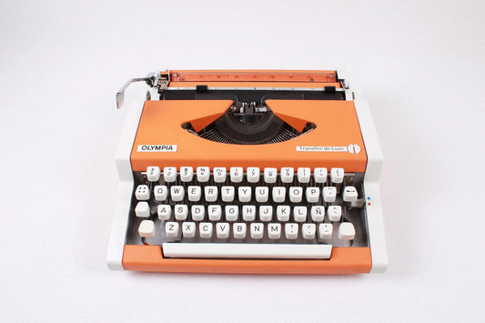 Olympia Traveller Orange Typewriter, Vintage Manual, Refurbished - ElGranero Typewriter.Company