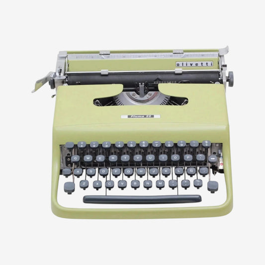 ElGranero Typewriter.Company vintage Olivetti Pluma 22 manual typewriter in original pistachio green finish