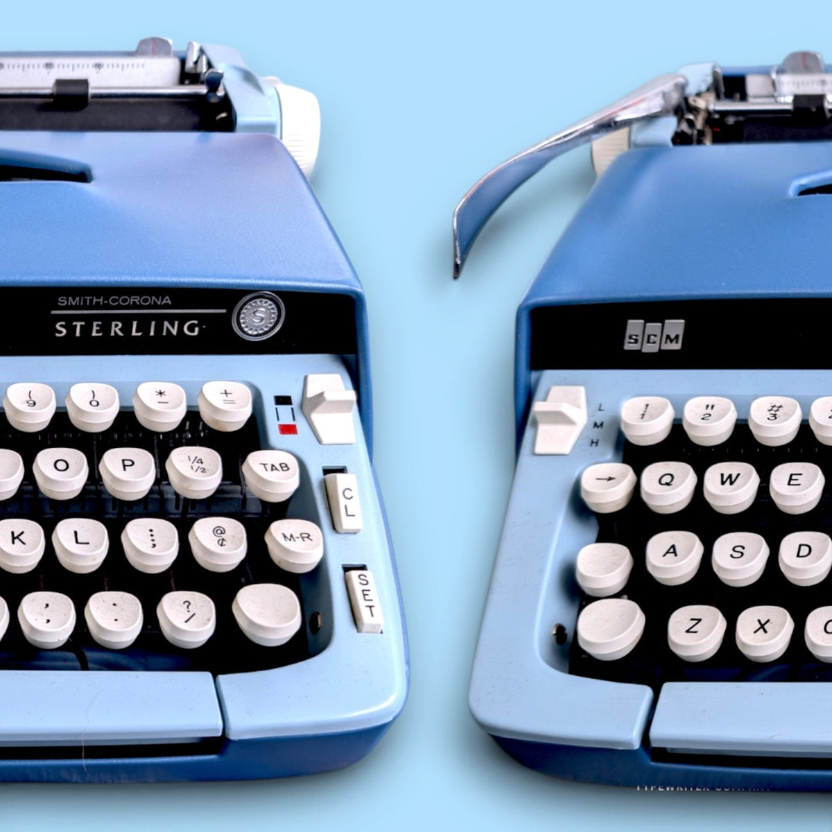 Smith-Corona Sterling blue portable typewriter, detailed view of controls and branding
